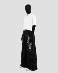 Rebellious Threads—Bold Black Denim Pants