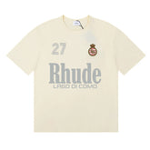Rhude Lago Di Como 27 Crest Graphic Cream Short‑Sleeve Tee