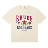 Rhude Bordeaux Grand Vin Crest Emblem Vintage Graphic Cream Short Sleeve T‑Shirt