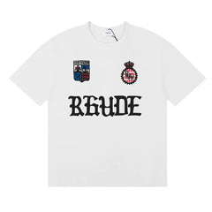 Rhude Cote D'Azur Shield Crest Gothic Letter Graphic Short Sleeve T-Shirt